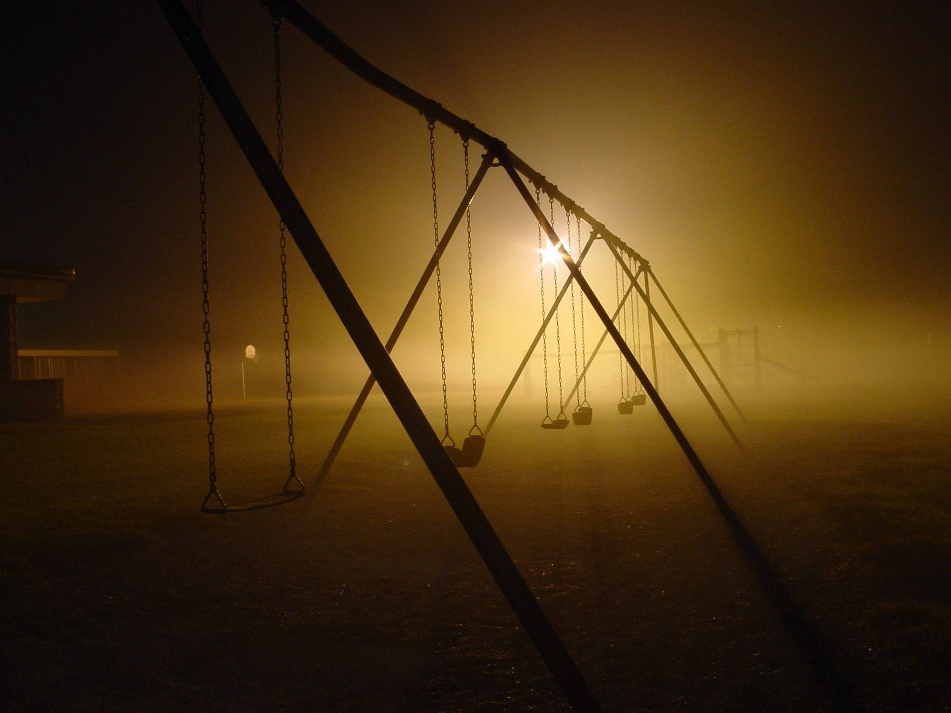 Dark Playground Swing Set