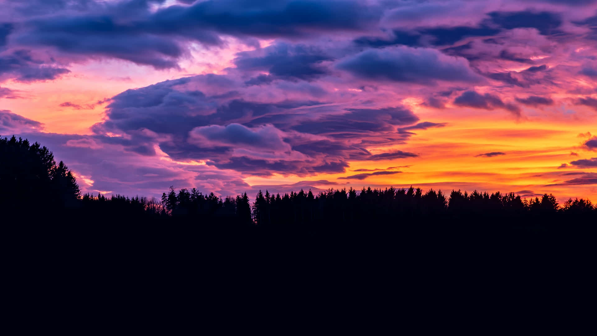 Dark Purple Sunset Cloud Background