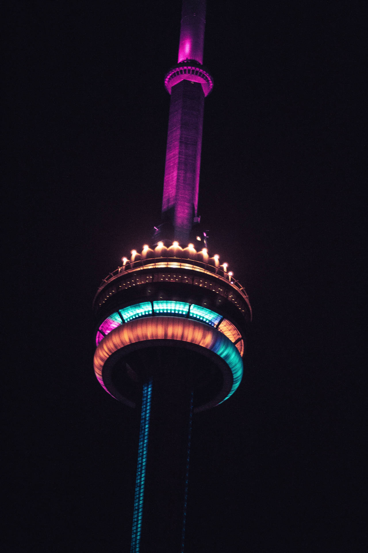 Dark Purple-toned Display Of Cn Tower On Iphone Background