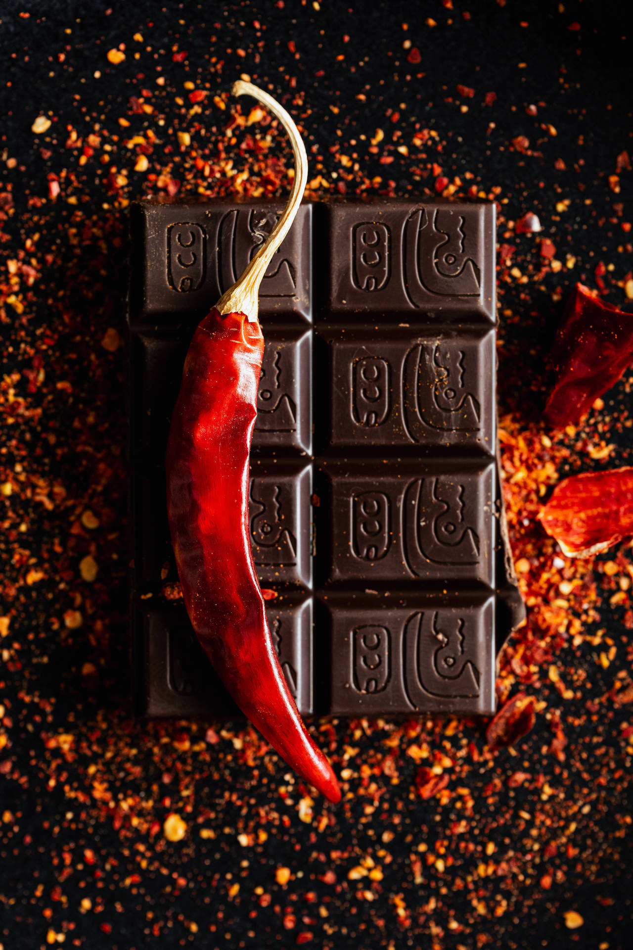 Dark Red Chili And Chocolate Background