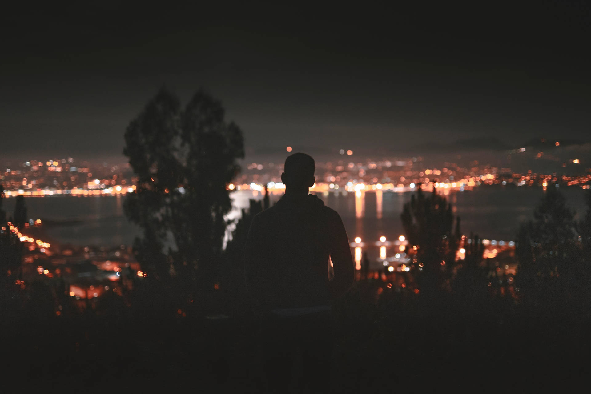 Dark Sad Man Looking Over City Background