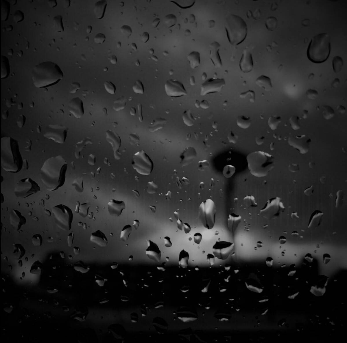 Dark Seattle Rain On Glass Background