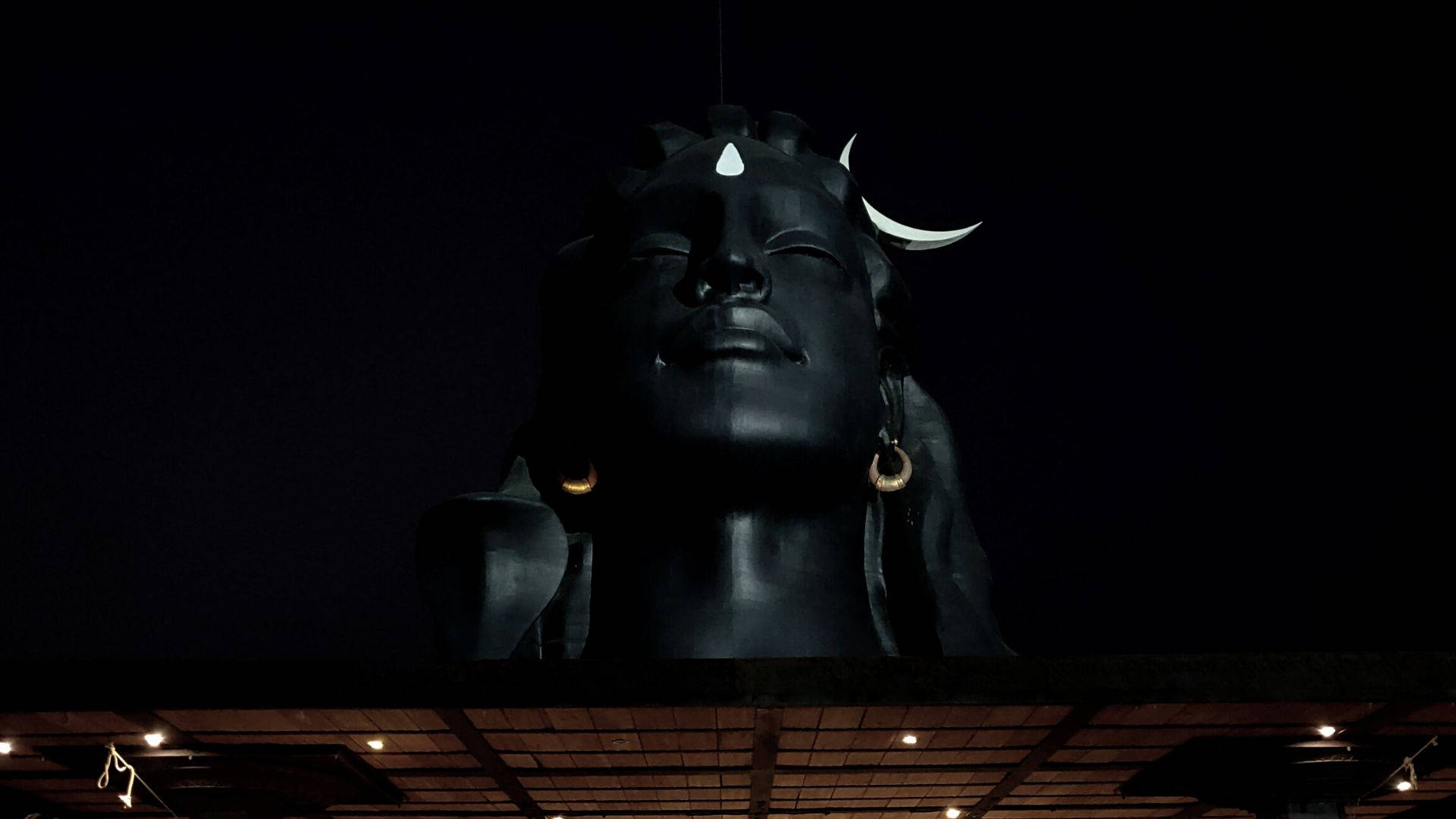Dark Shiva Head Nighttime Sky