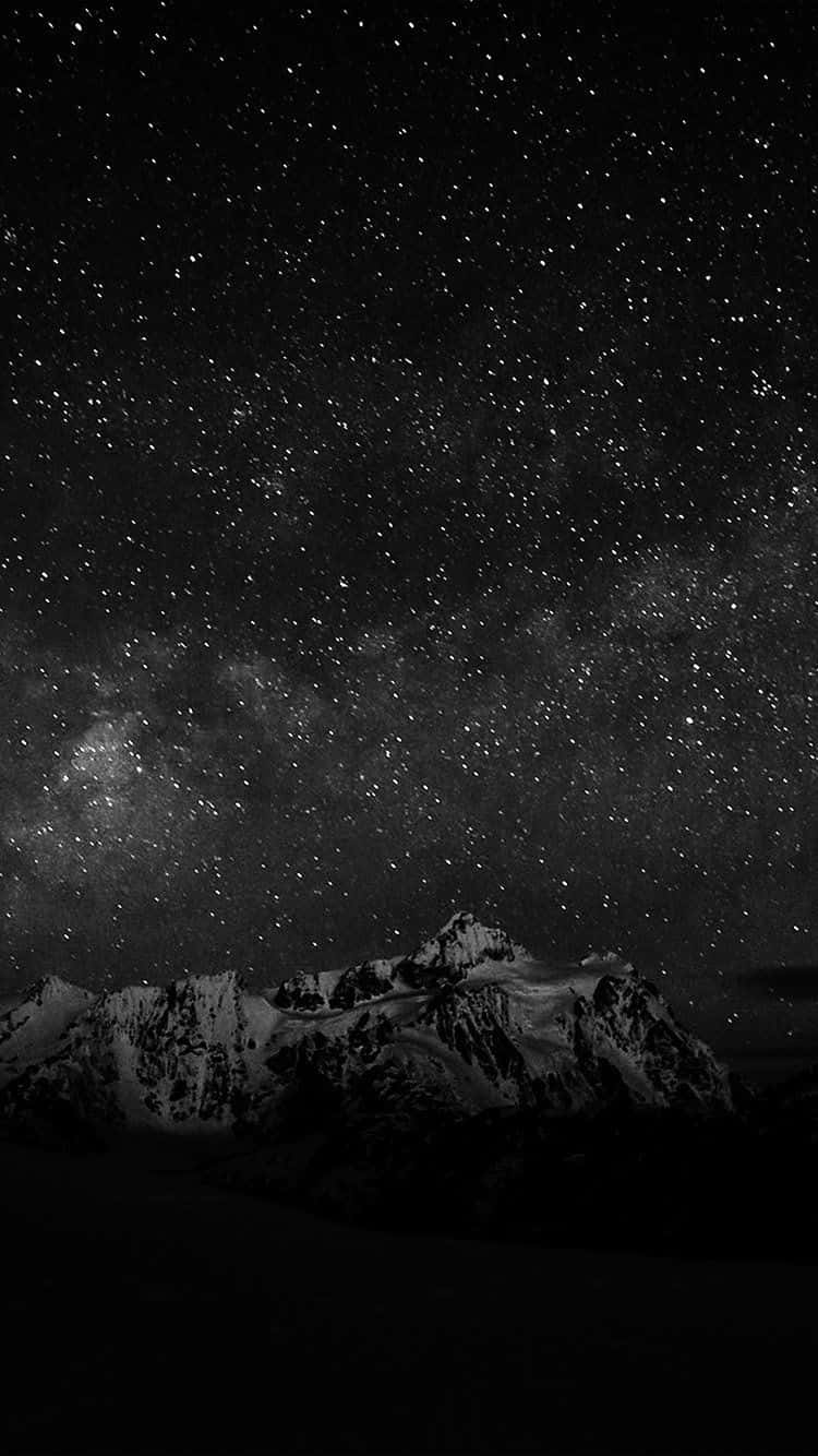Dark Starry Night Over Snow Mountain Background