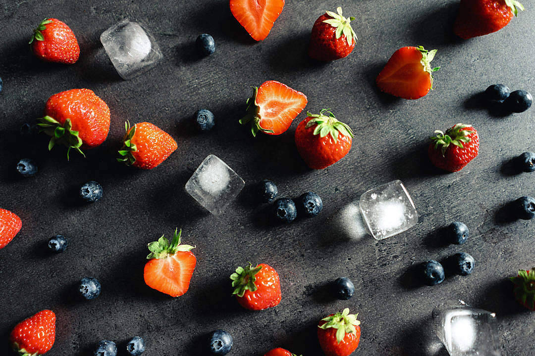 Dark Theme Berries And Ice Cubes Background