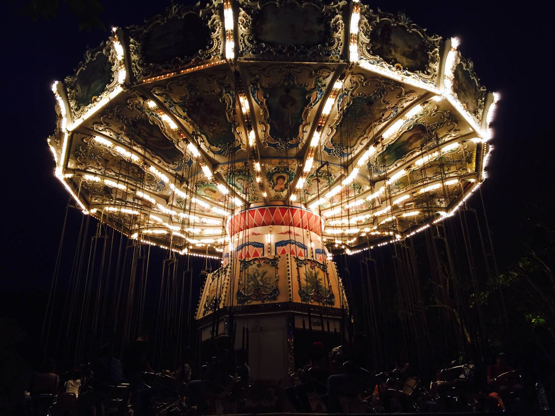 Dark Theme Carousel Ride At Night Background