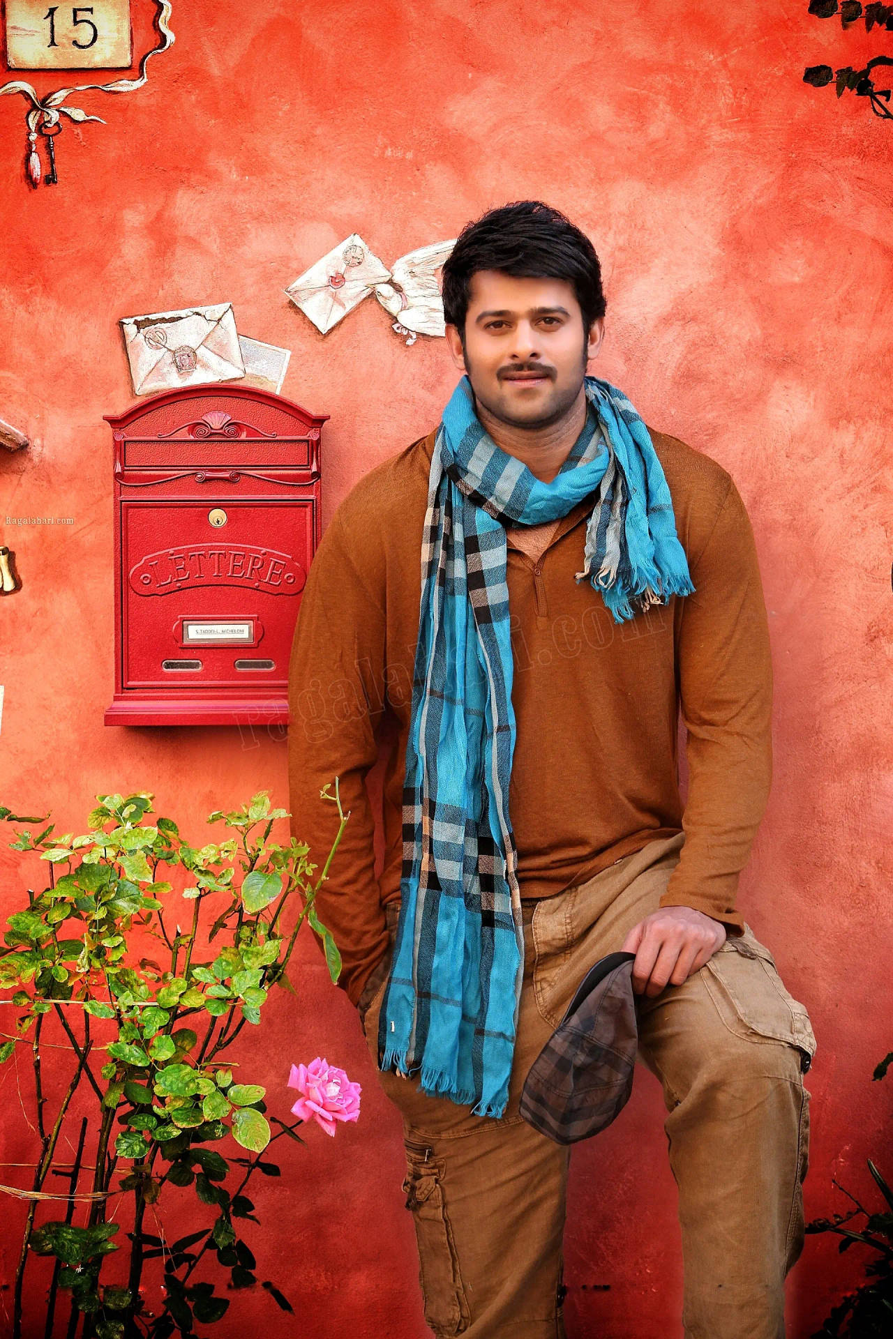 Darling Prabhas Movie Posing With Scarf Background