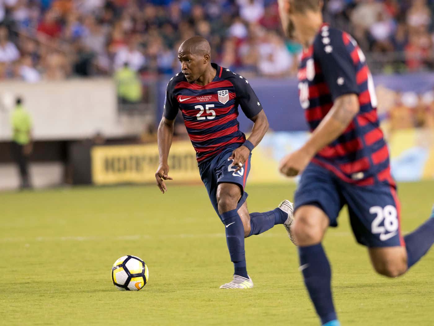 Darlington Nagbe In Action During A Concacaf Match Background