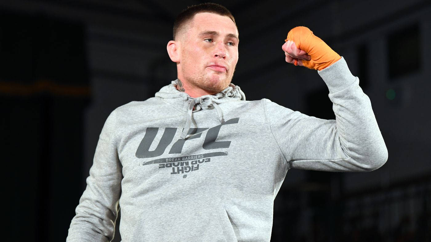 Darren Till Posing For Fans Background