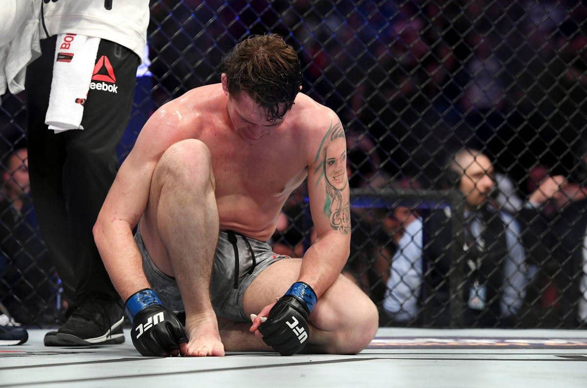 Darren Till Resting On Octagon