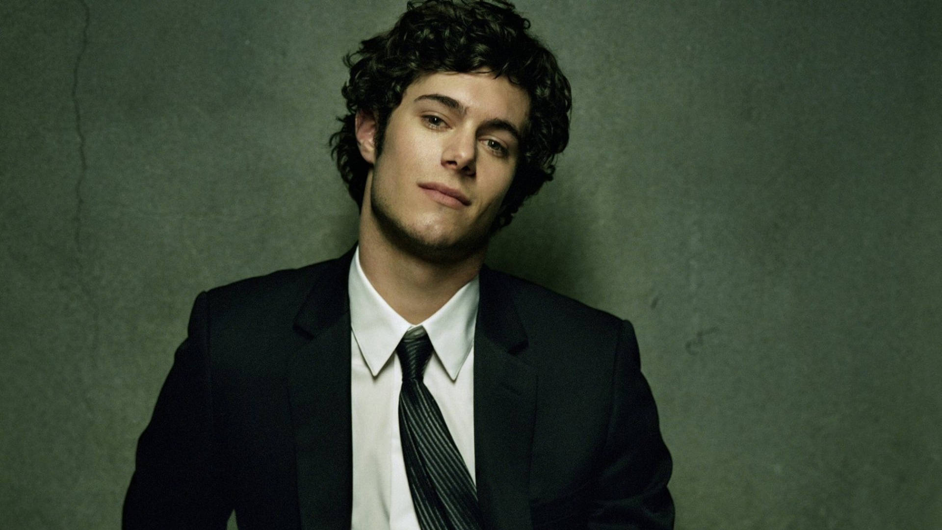 Dashing Adam Brody Background