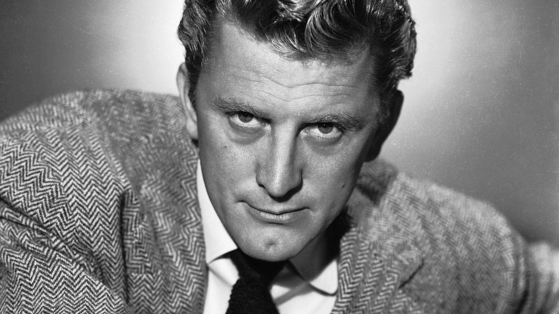 Dashing Kirk Douglas In Archival Photo From 1946 Background