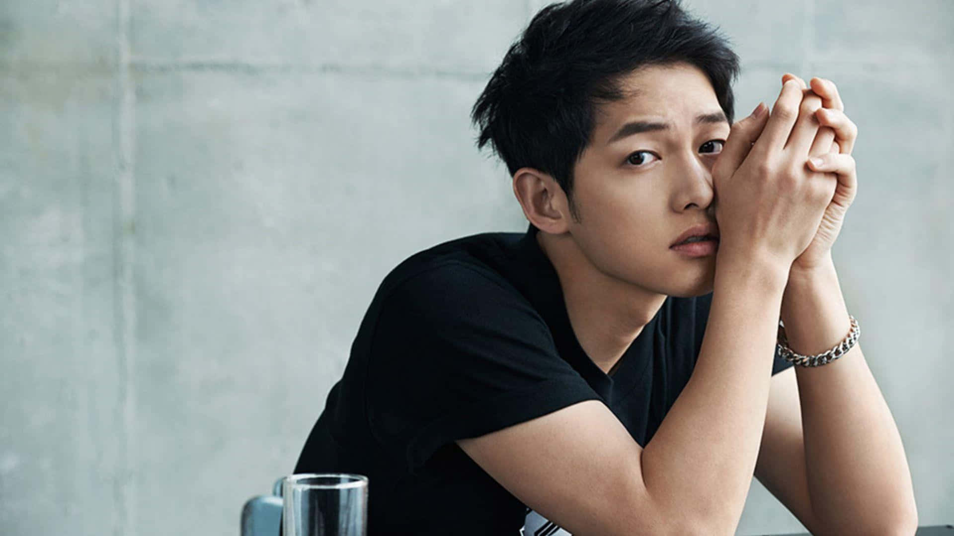 Dashing Song Joong Ki In A Stylish Suit Background