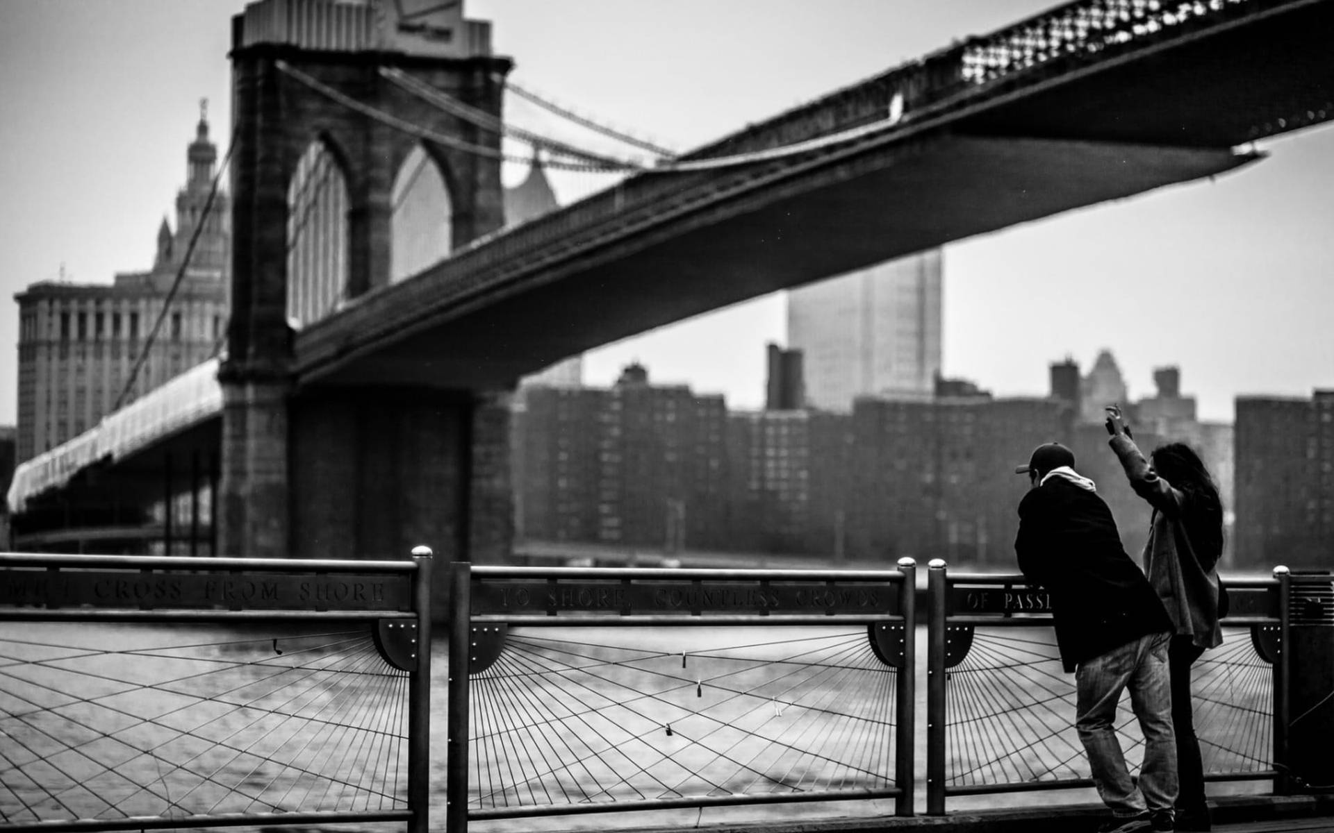 Date On East River And Brooklyn Bridge Background