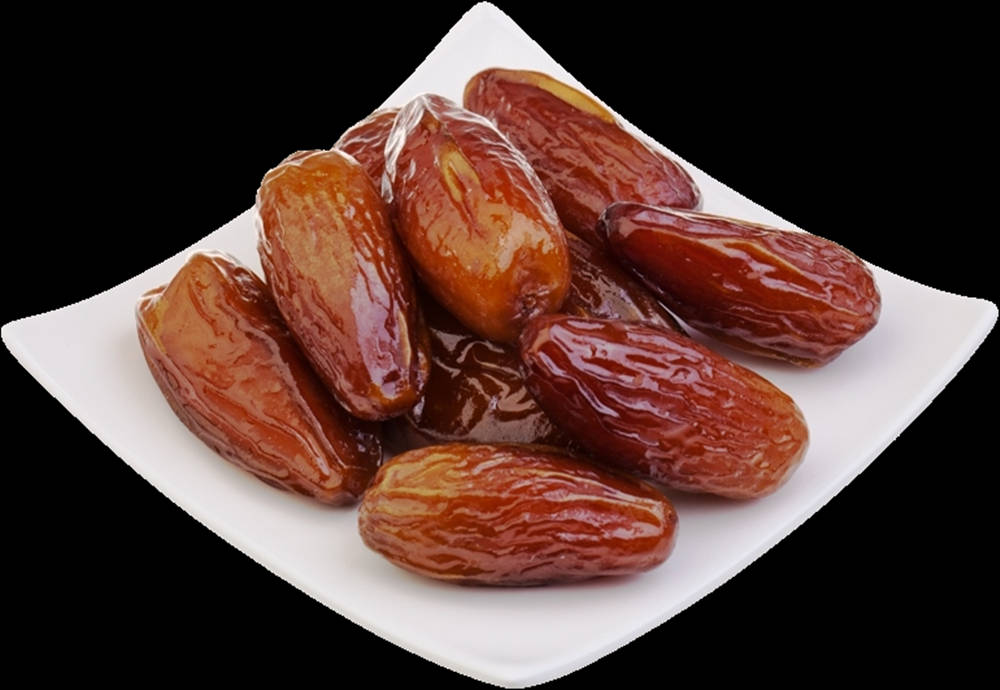 Dates On A Mini White Plate Background