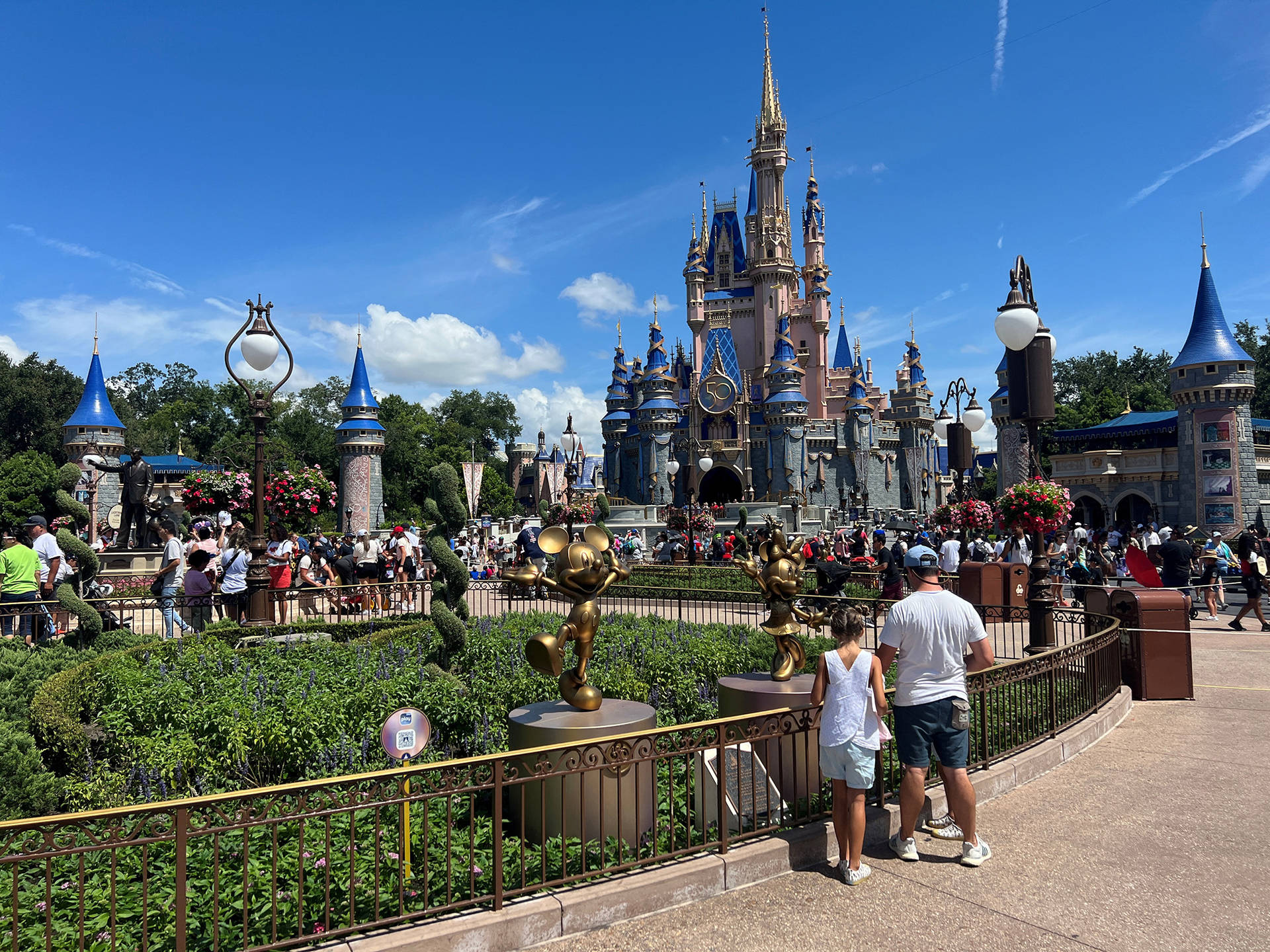 Daughter And Father At Disneyworld Background