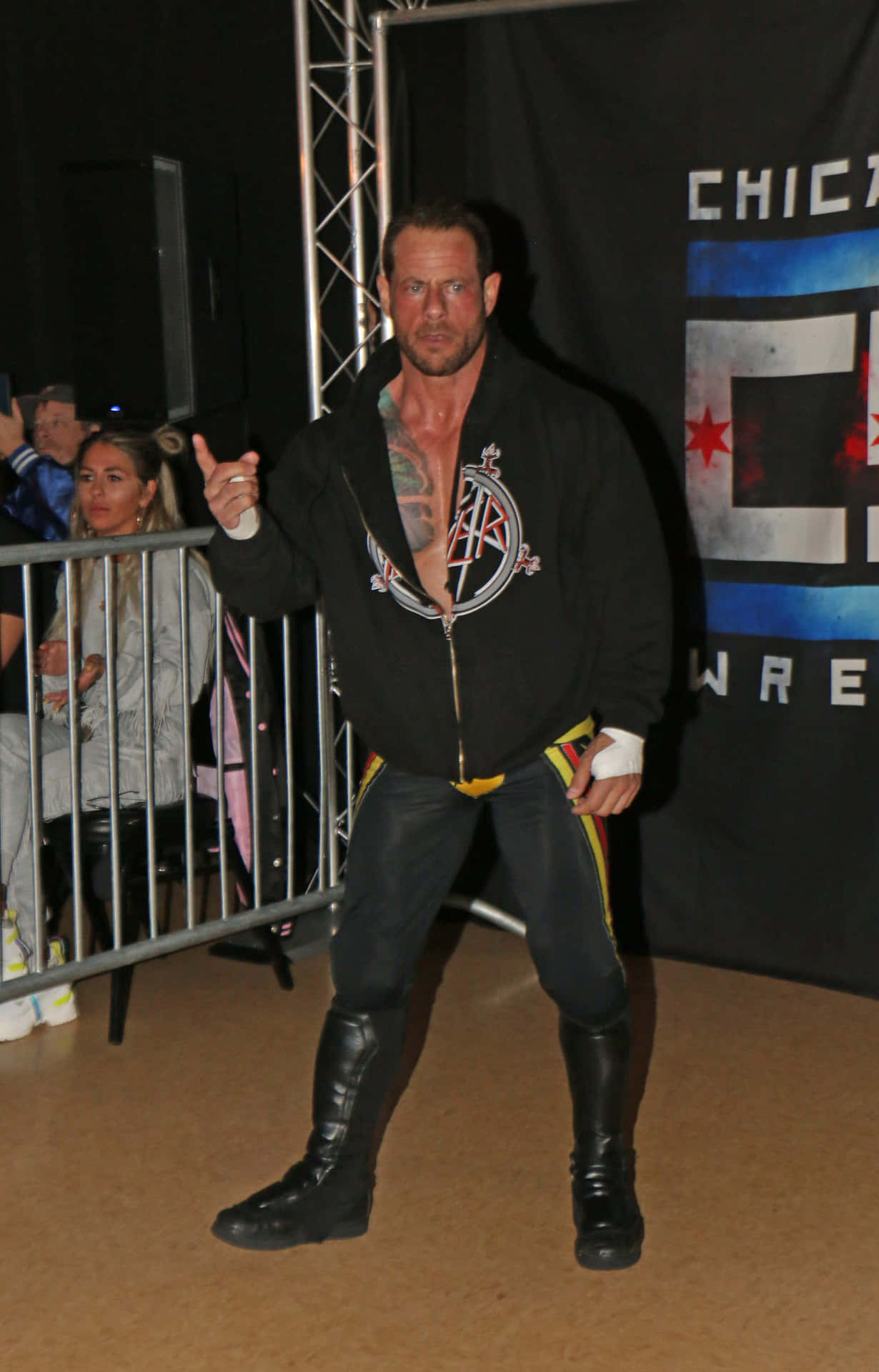 Davey Richards Displaying His Wrestling Prowess In A Chicago Style Wrestling Event Background