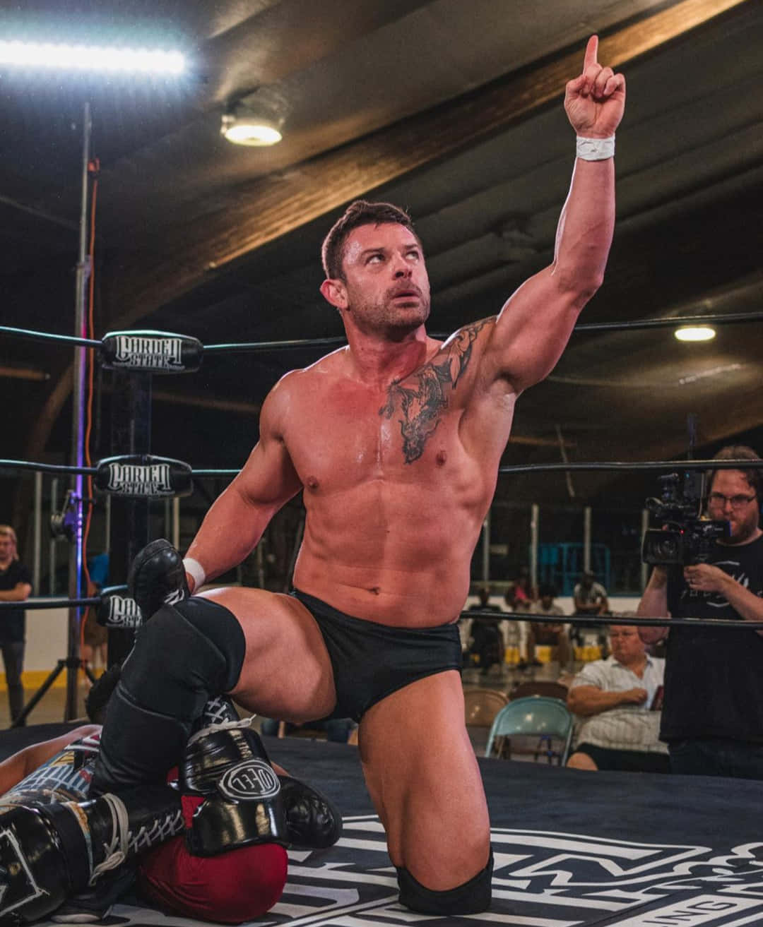 Davey Richards Ring Pointing Upwards Background