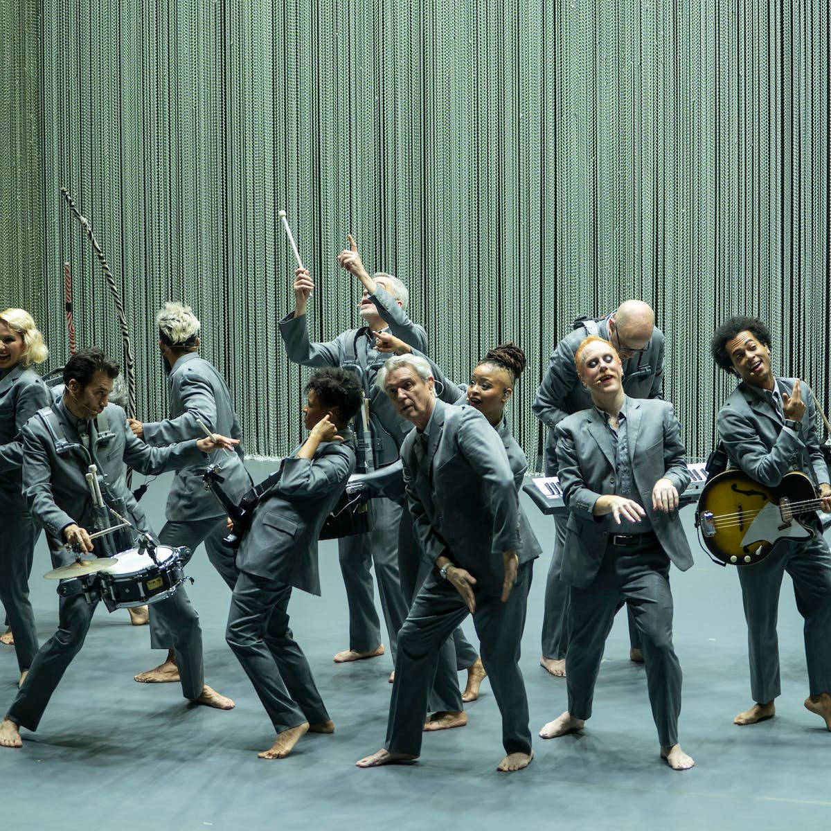 David Byrne With American Utopia Cast Background