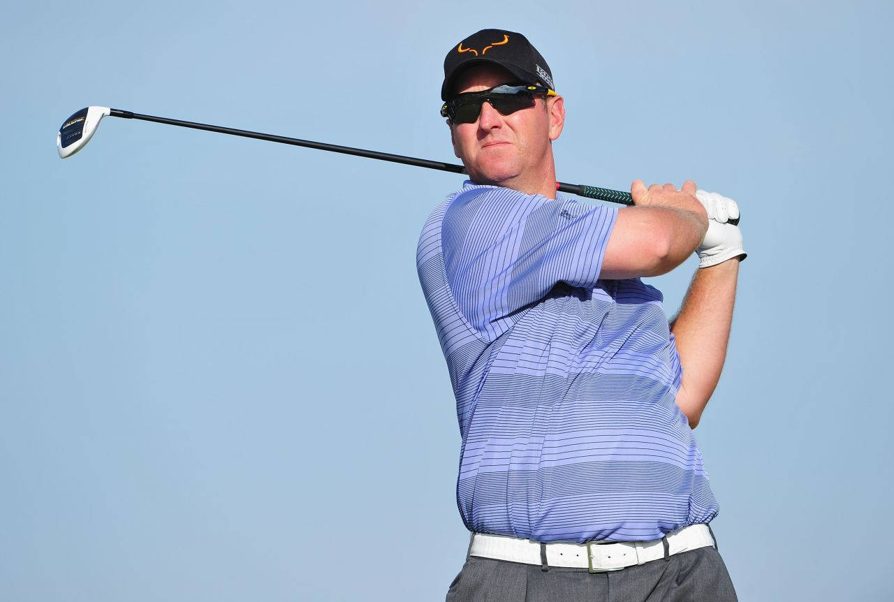 David Duval In Blue-striped Shirt Background