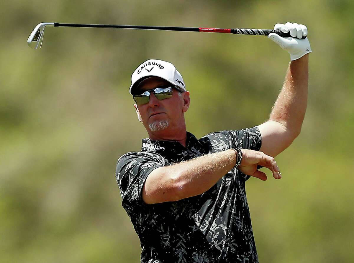 David Duval Raising His Golf Club Background