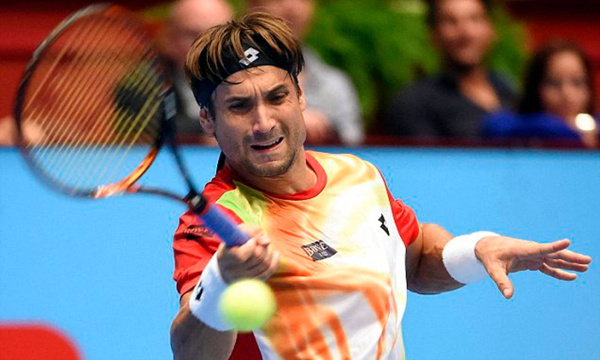 David Ferrer Executing A Forehand Stroke In A Match. Background