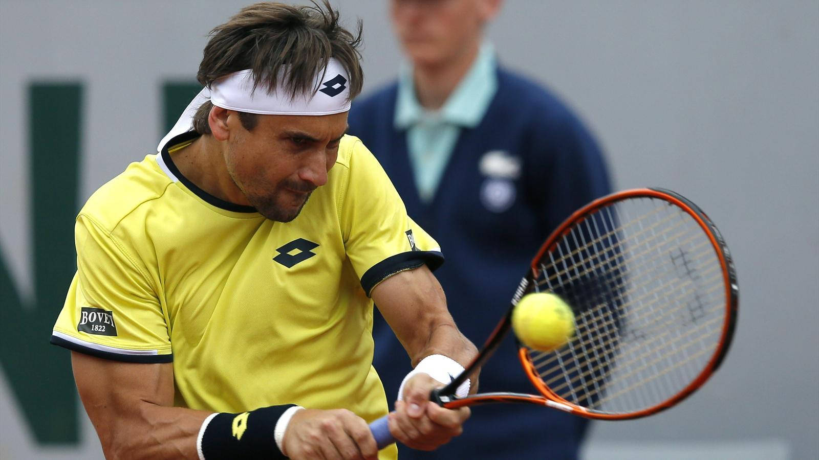 David Ferrer In Action With Double Hand Stroke Background