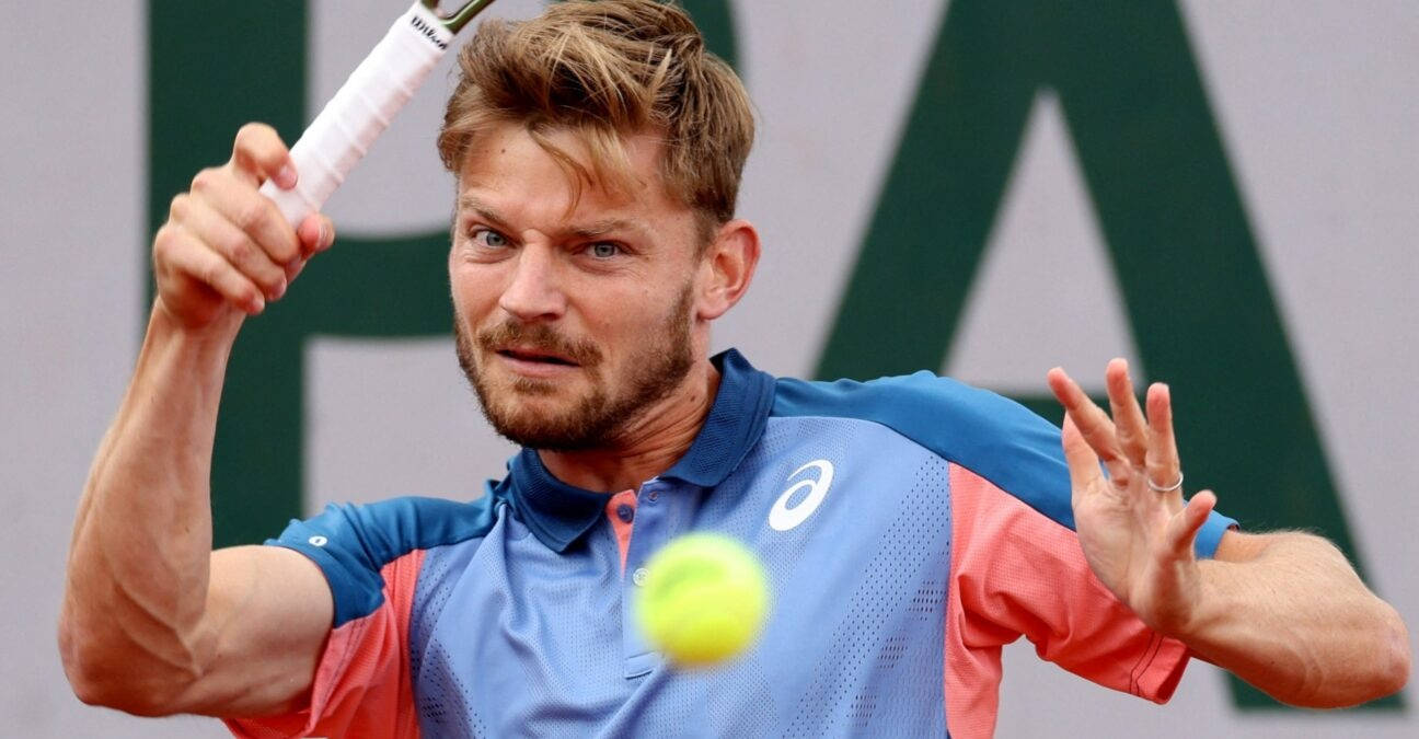 David Goffin In Action On The Tennis Court Background