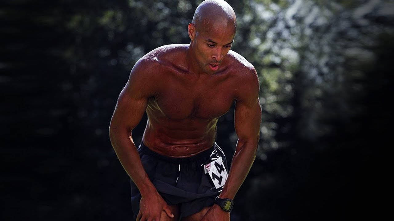 David Goggins Resting During Marathon Background