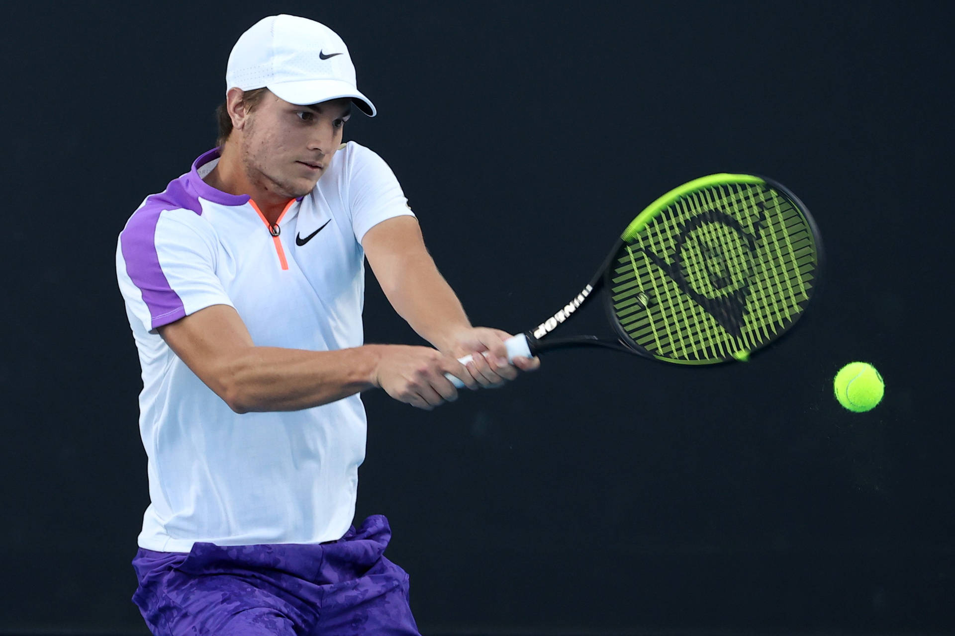 David Nalbandian Demonstrating A Double-handed Stroke In A Tennis Match Background