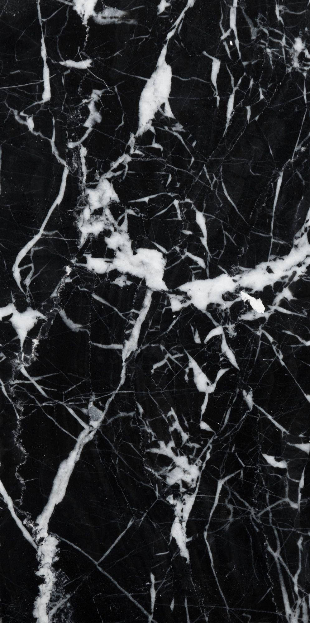 Dazzling Black Marble Iphone Wallpaper With White Splashes Background