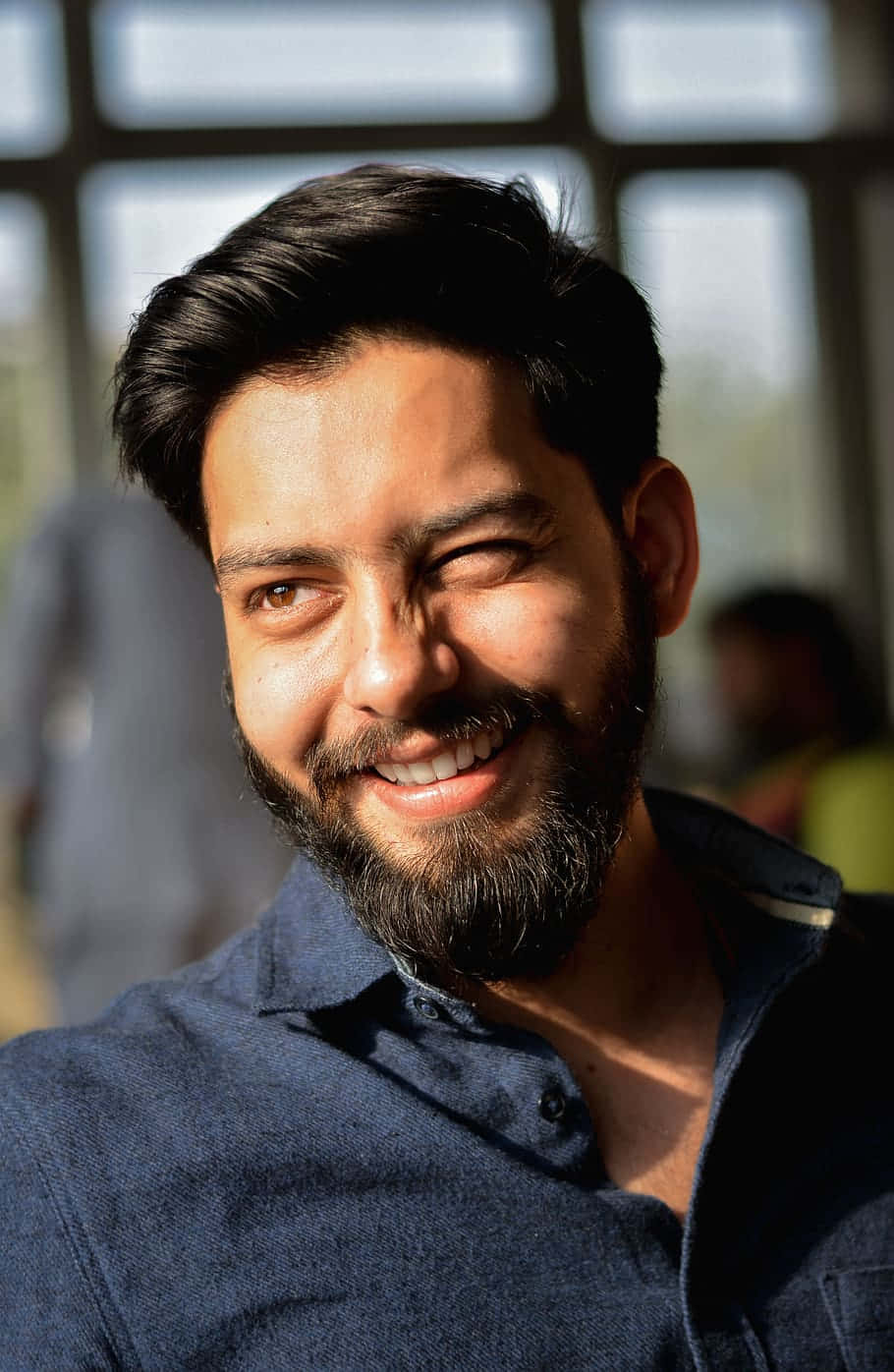 Dazzling Indian Guy Sunlight Close Up Angle Shot Background