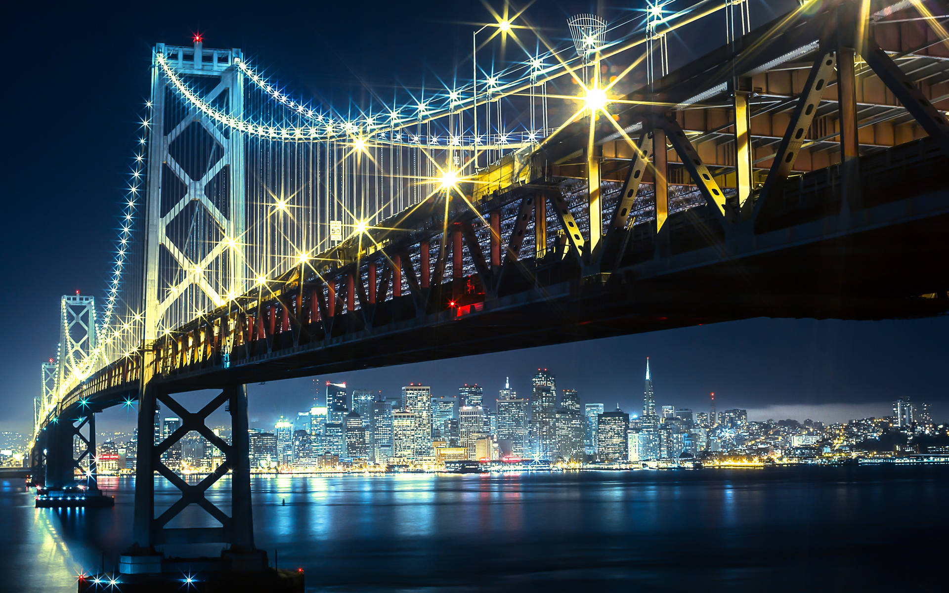 Dazzling View Of The Bay Bridge In San Francisco Background