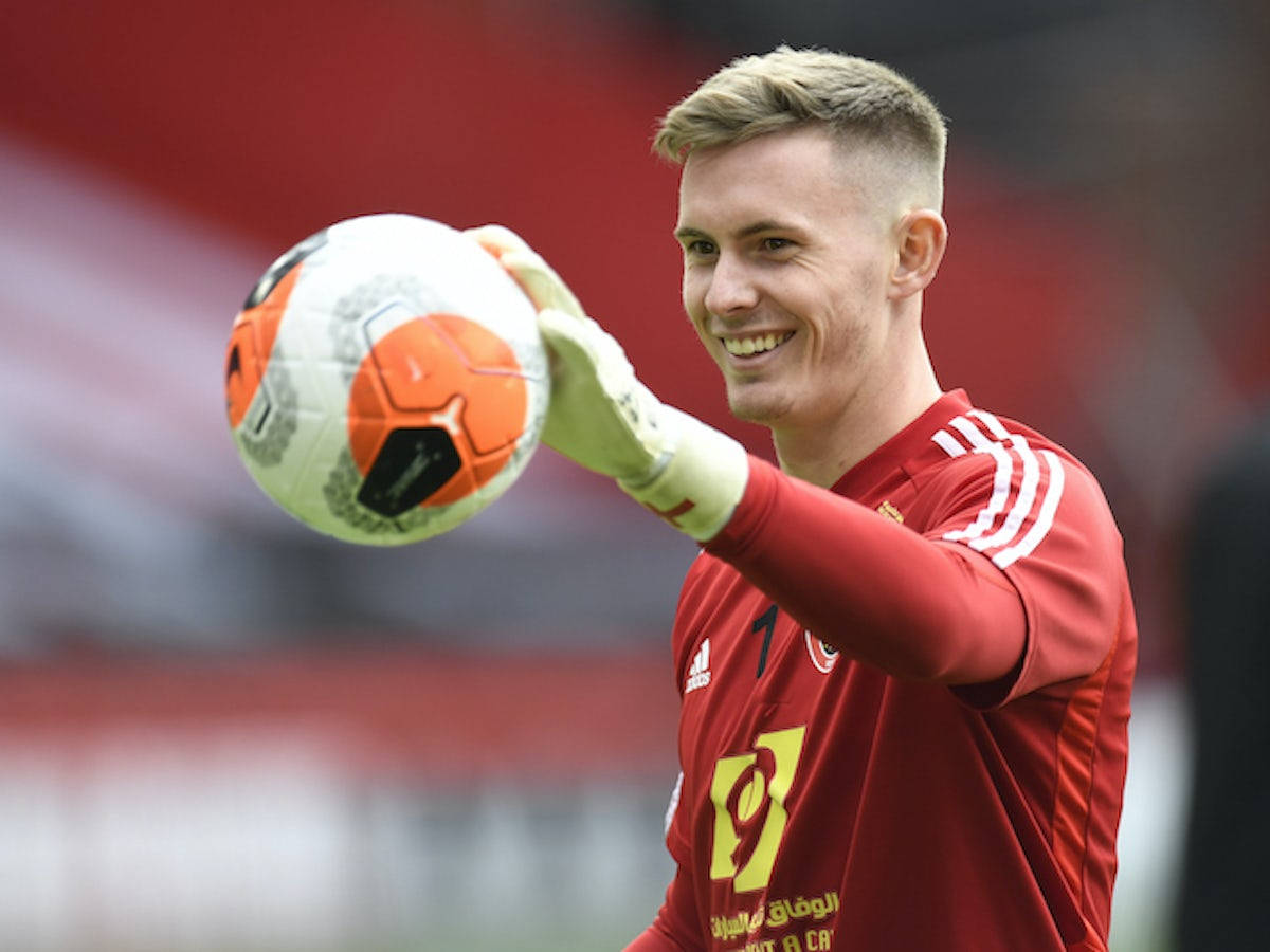 Dean Henderson Holding Out Ball Background