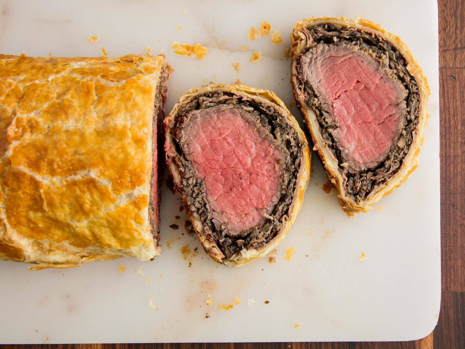 Decadent Beef Wellington With A Pinkish Center Background