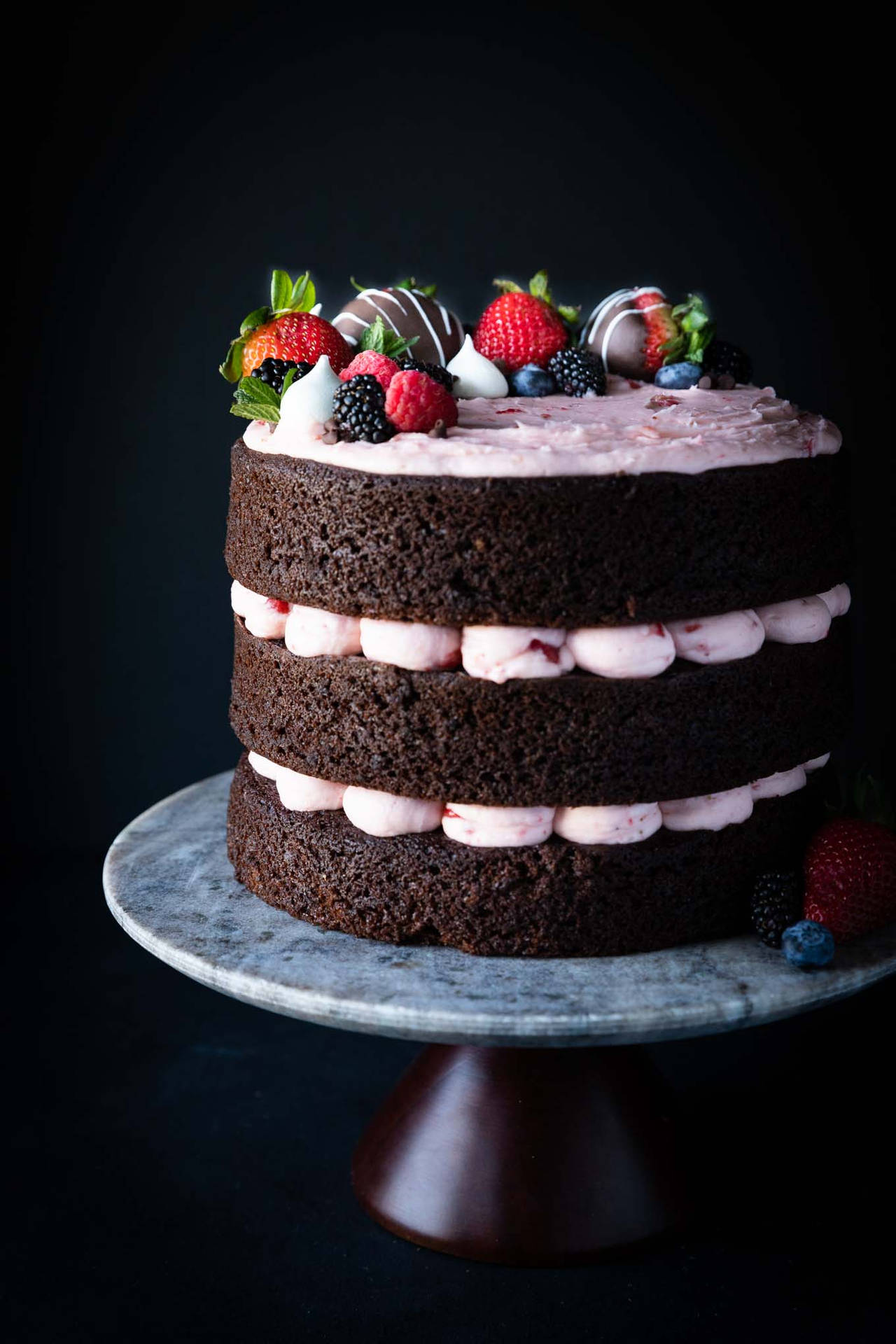 Decadent Chocolate Cake With Fresh Strawberry Filling Background