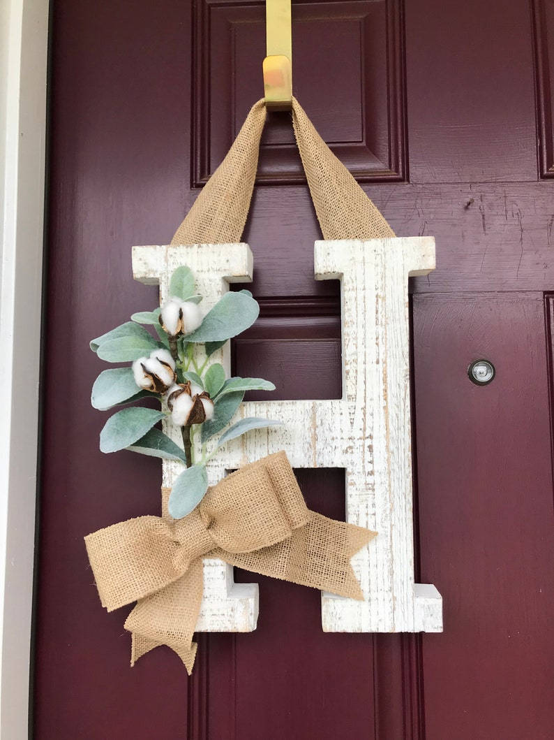 Decorative Letter H Crafted From Burlap Ribbon Background