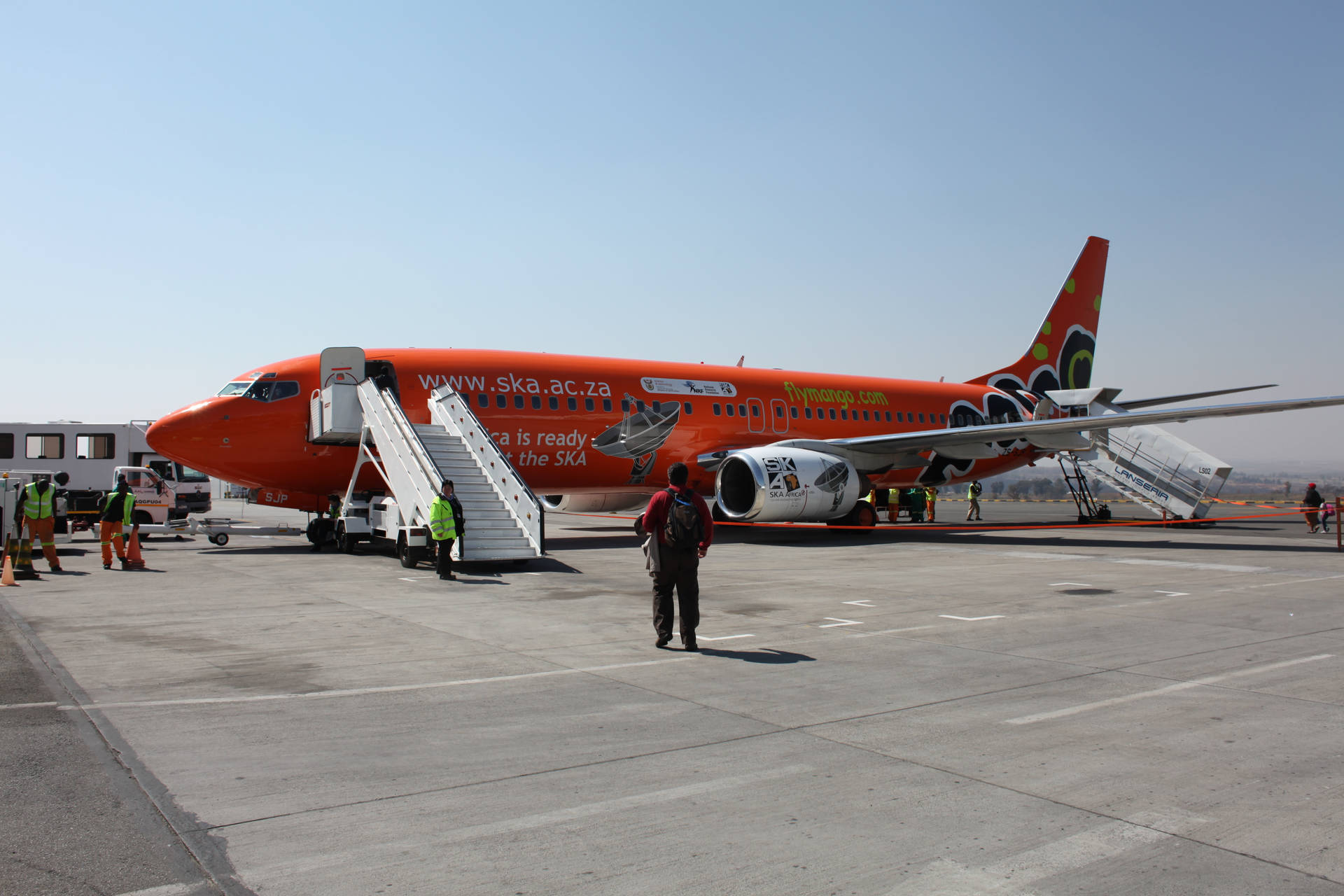 Dedicated Mango Airlines Airport Personnel Ensuring Smooth Operations.