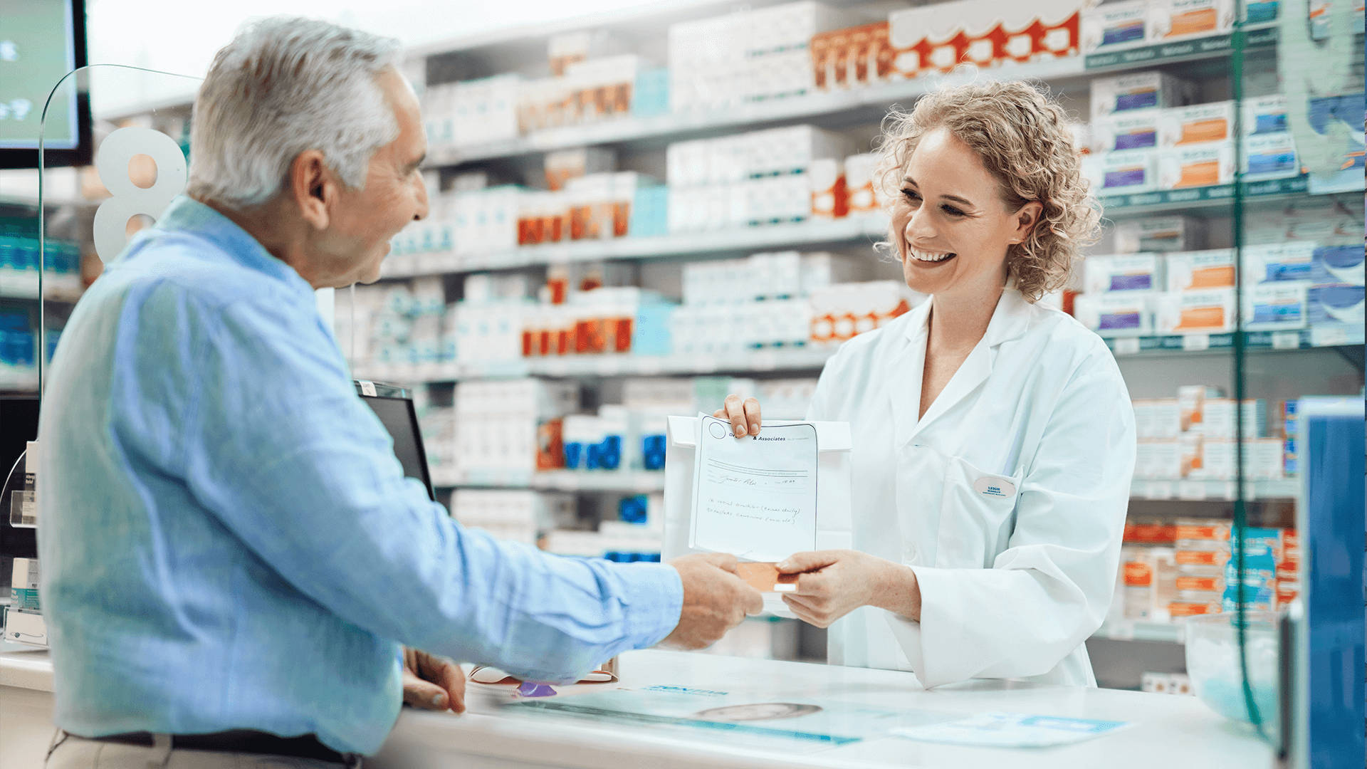 Dedicated Pharmacist Assisting Senior Patient Background