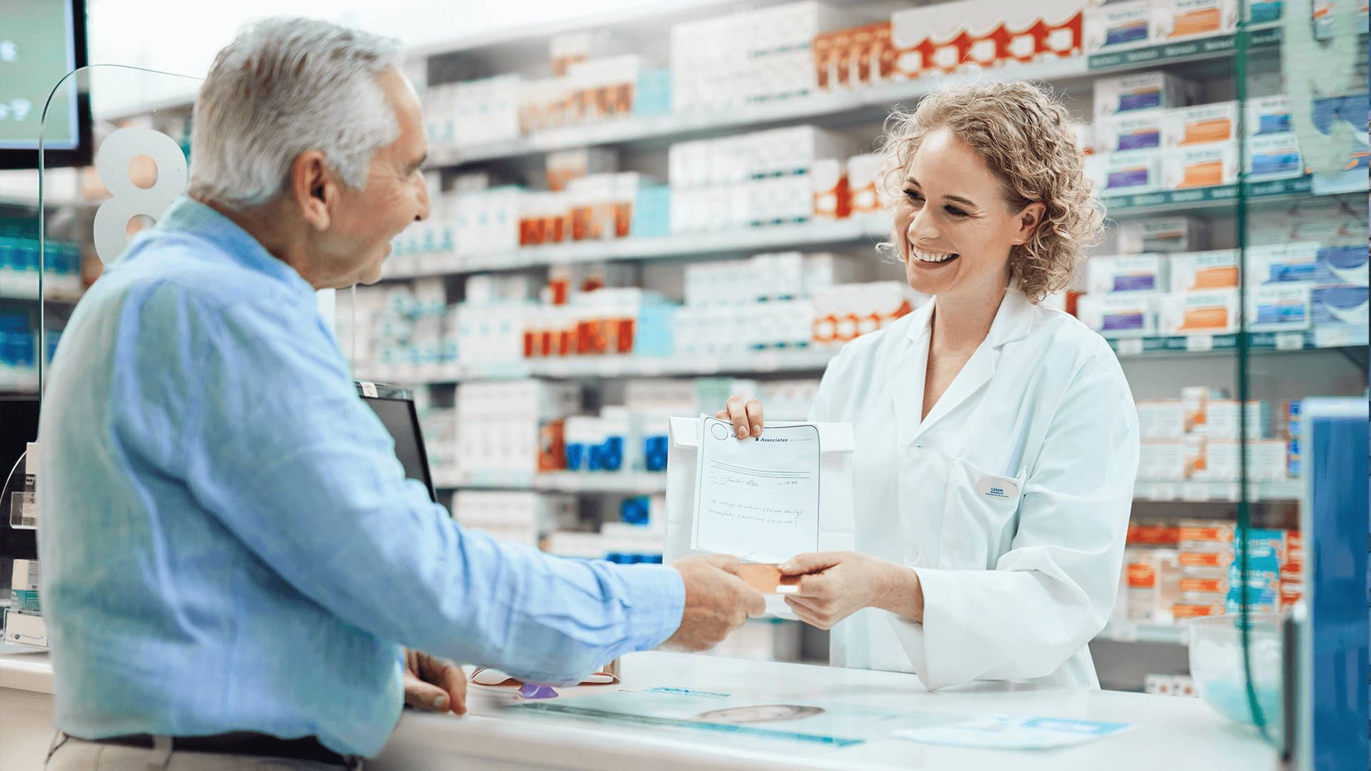 Dedicated Pharmacist Assisting Senior Patient