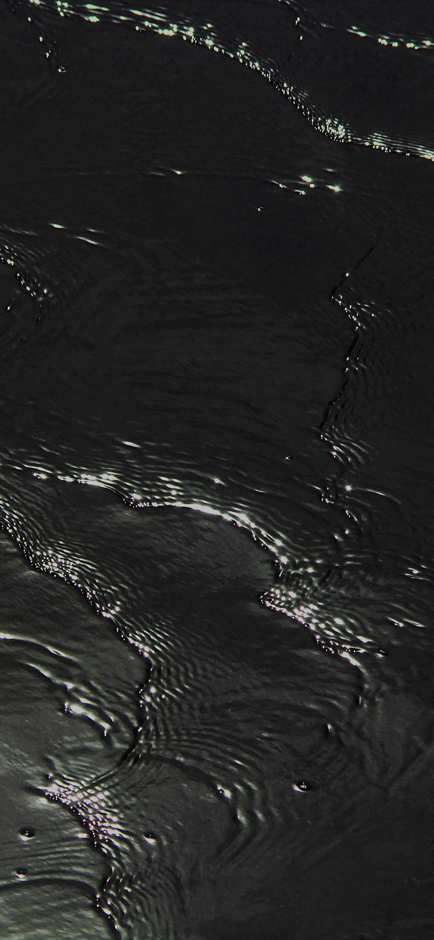 Deep Black Rippling Water Background