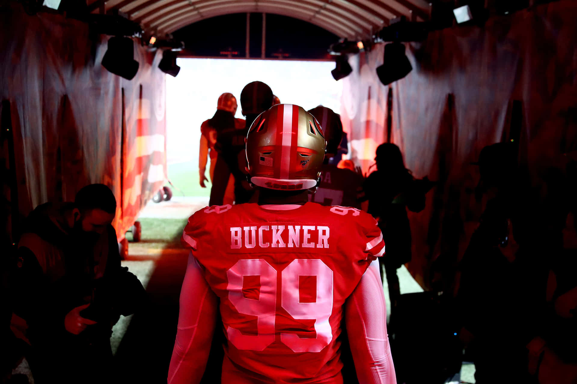 Deforest Buckner At The Football Tunnel Entrance Background