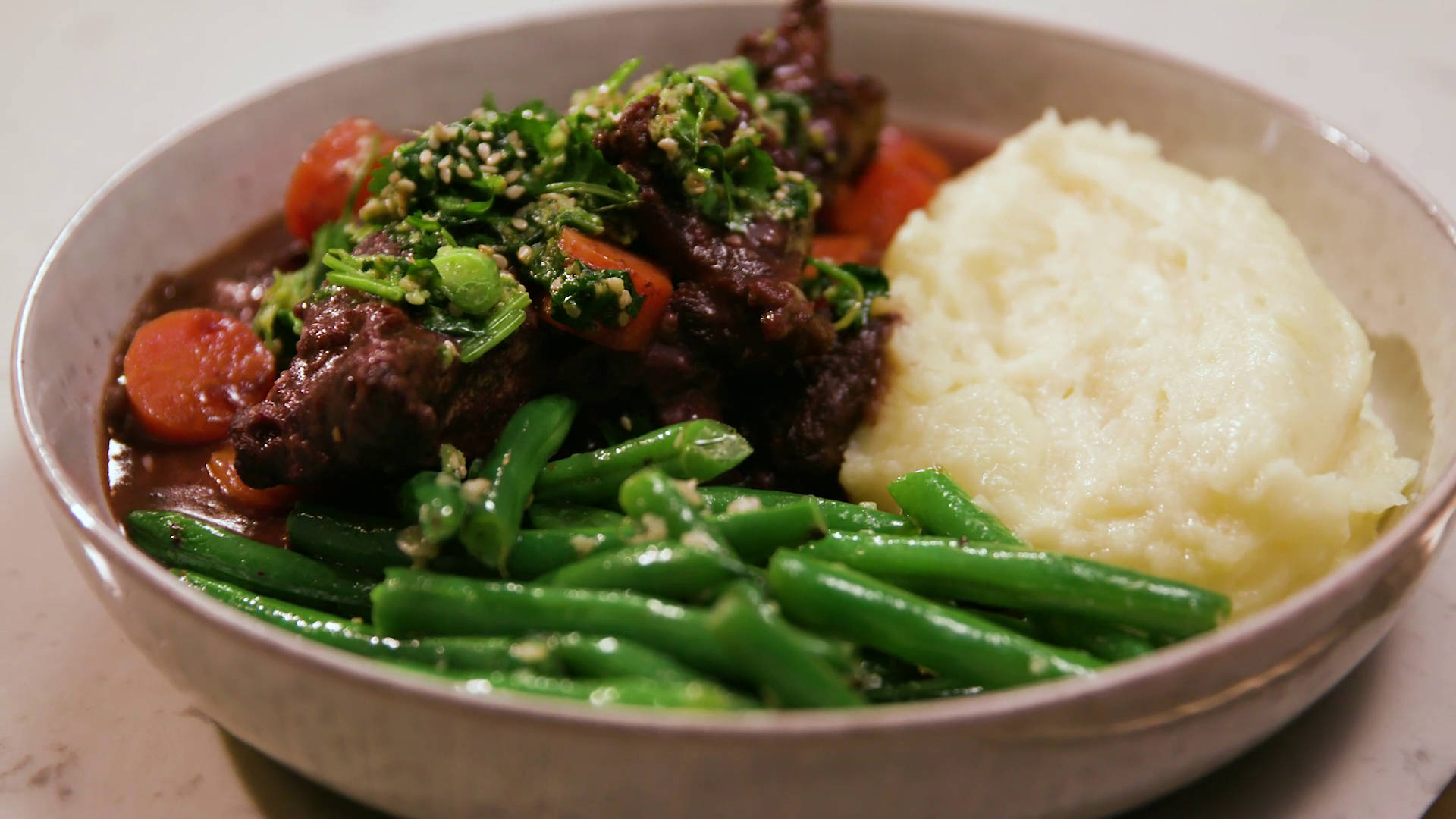 Delectable Beef Bourguignon Served With Fresh String Beans Background