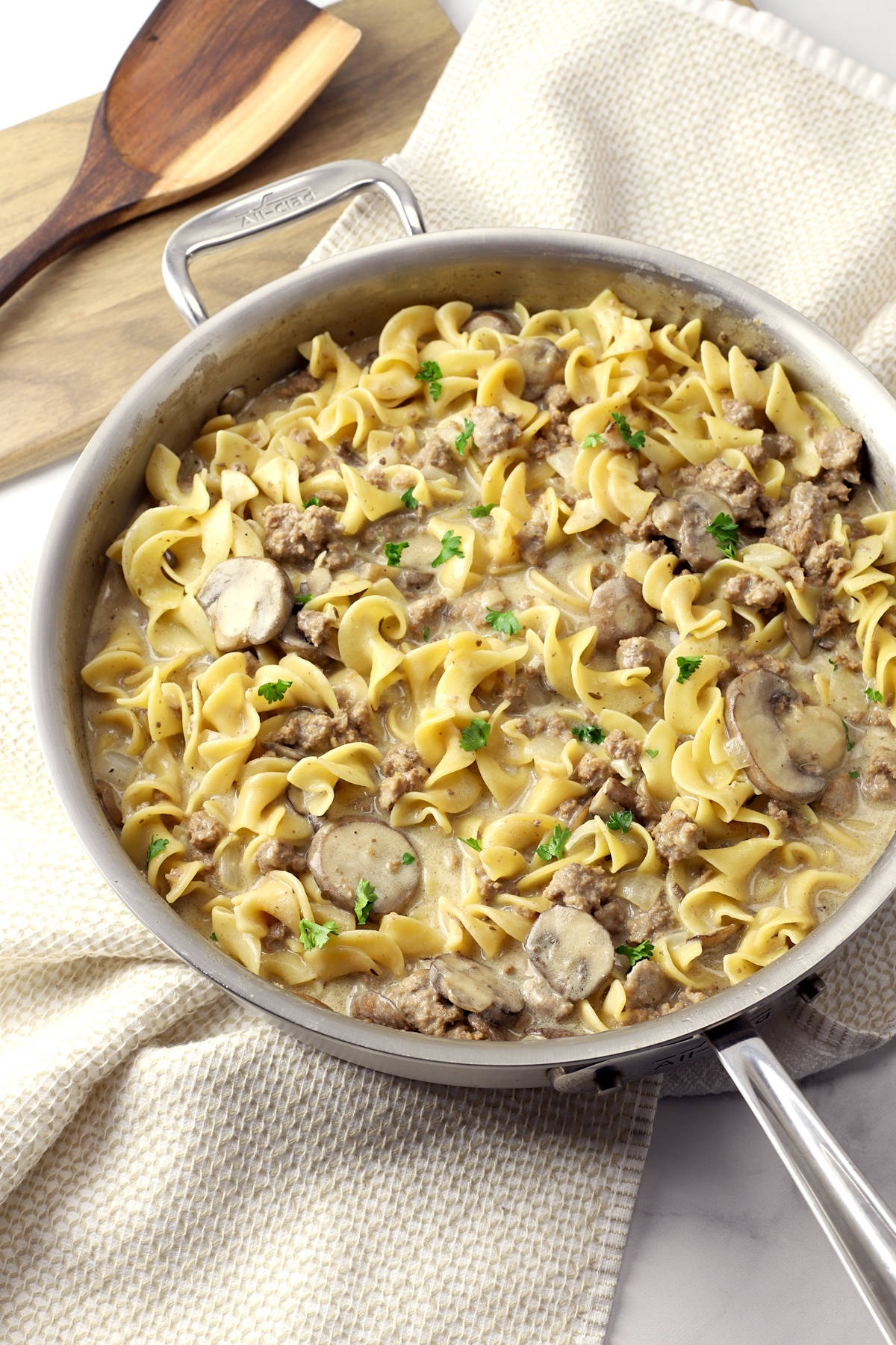 Delectable Beef Stroganoff Served With Rotini Pasta Background