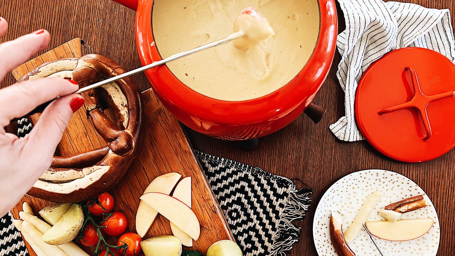 Delectable Cheese Fondue Served With Fresh Apples Background