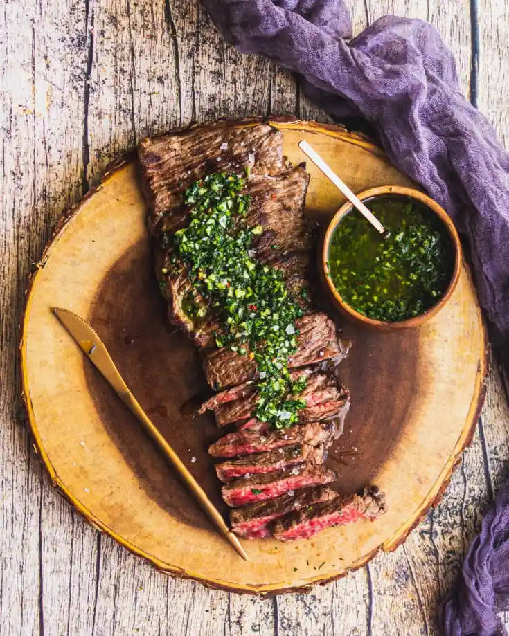 Delectable Churrasco Steak With Fresh Chimichurri Sauce Background