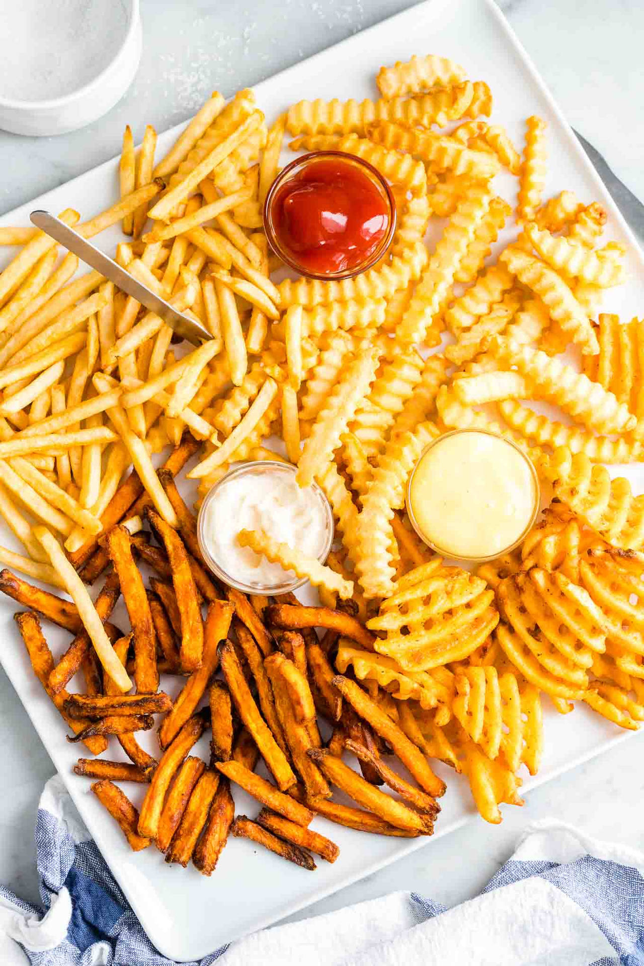 Delectable French Fries Variety Background