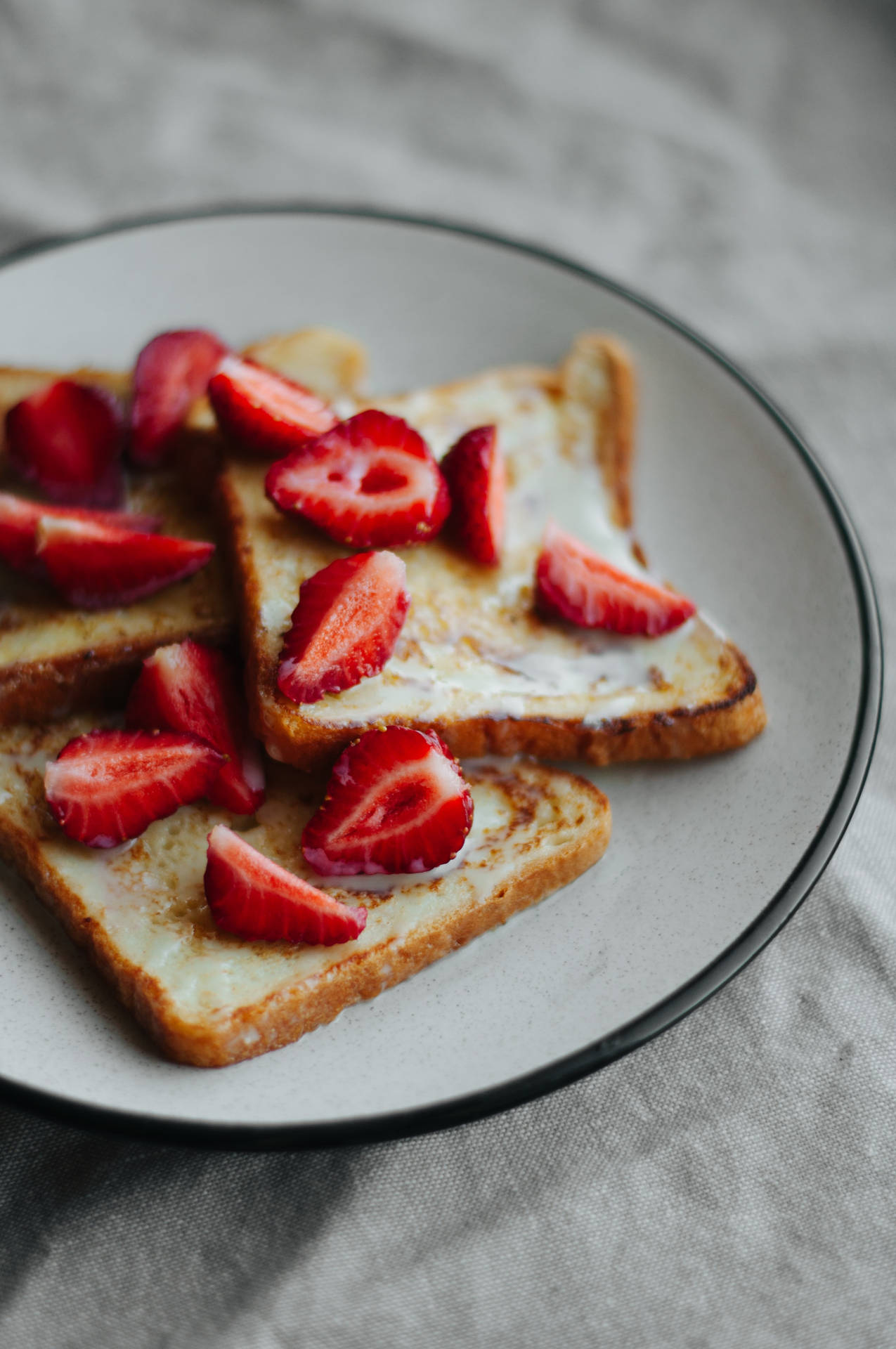 Delectable French Toast With Fresh Berries And Maple Syrup Background