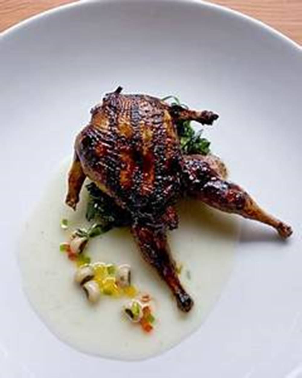 Delectable Grilled Quail With A Side Of Mushrooms