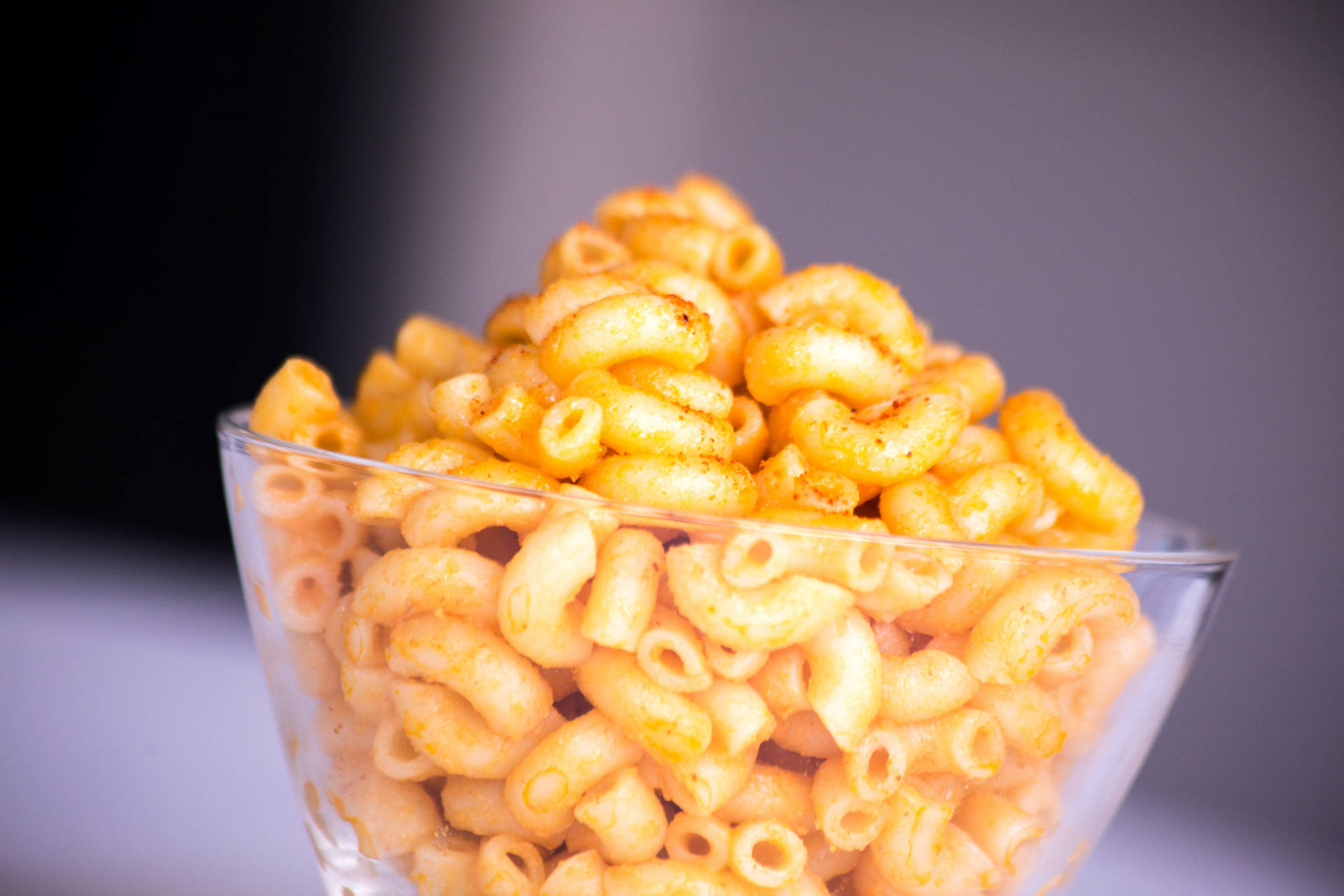 Delectable Mac And Cheese Served In A Glass Bowl Background